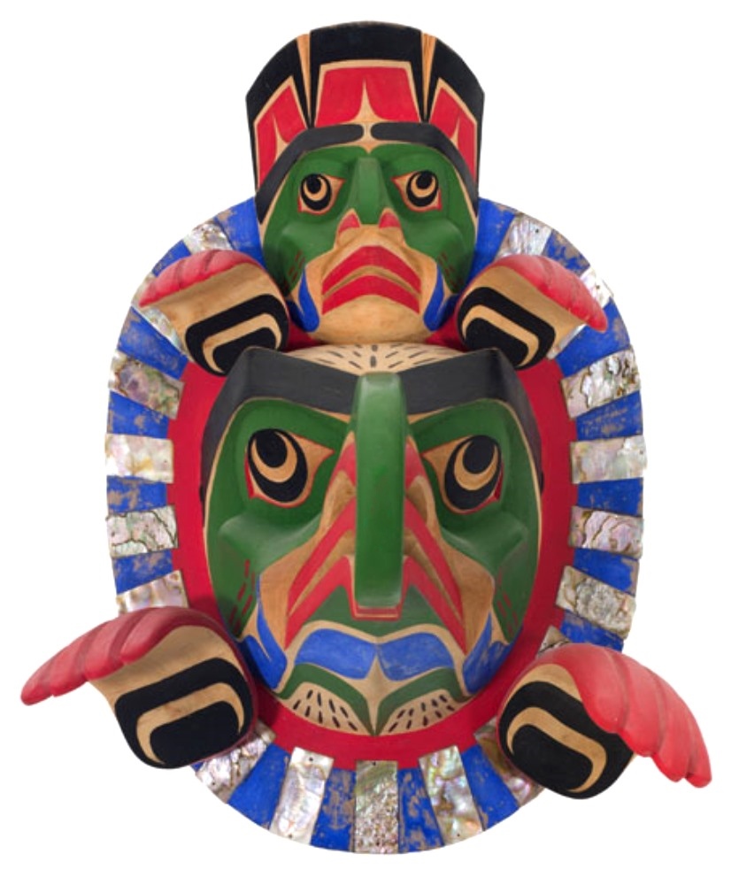 This cedar mask is made by the artist Beau Dick in 1980